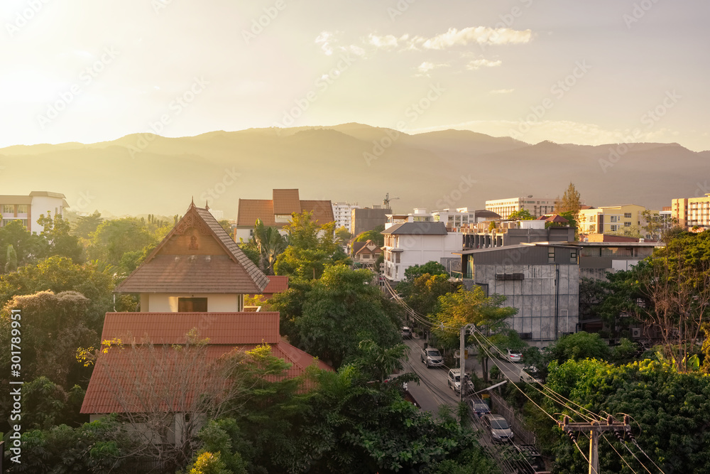 Chiang Mai cityscape with a Doi Suthep mountain at background at sunset, Thailand