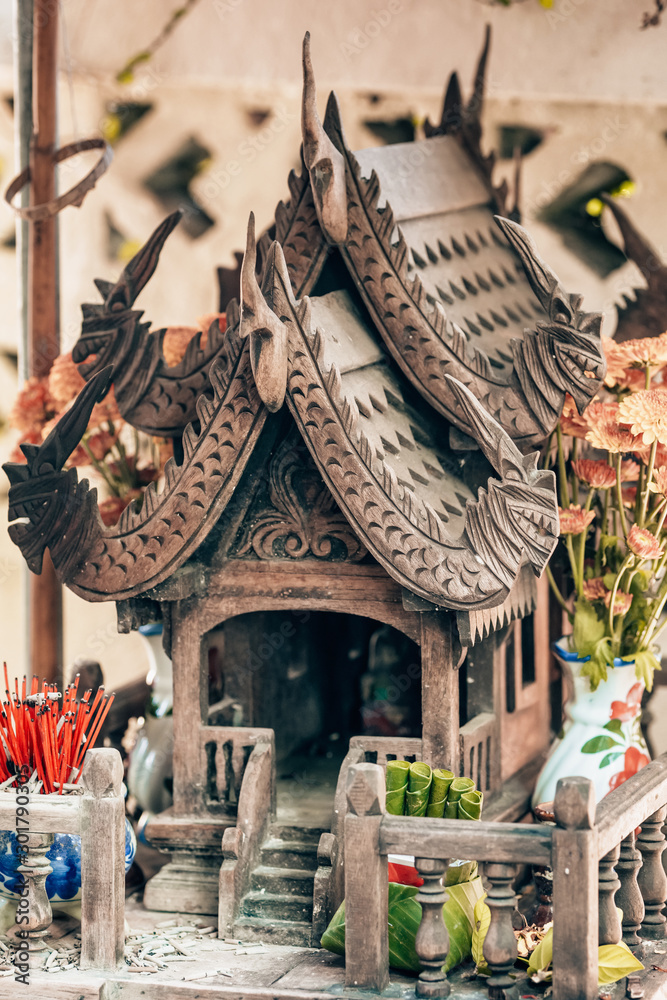 Fotografija Wooden carved spirit house in Thailand