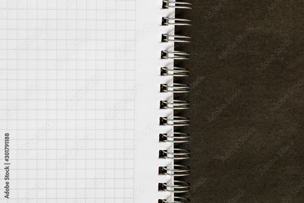 Empty sheet notebook on a black background