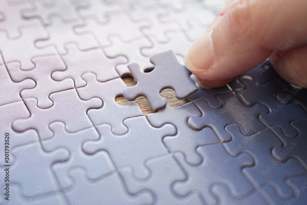 The matching last puzzle piece Stock Photo | Adobe Stock