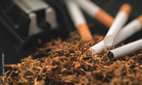 cigarette machine with tobacco and cigarettes photo