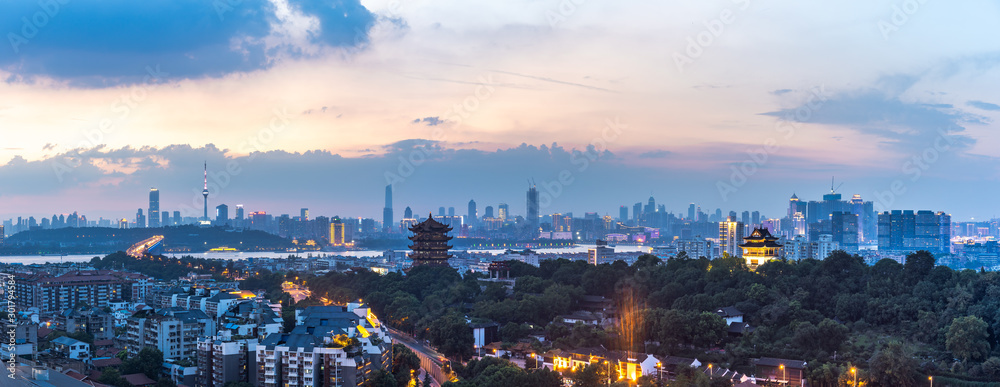 Fototapeta premium Wuhan skyline and Yangtze river with supertall skyscraper under construction in Wuhan Hubei China.