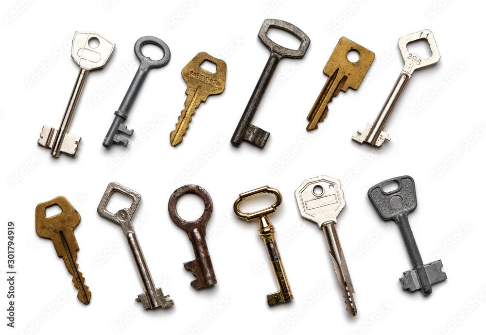 old keys isolated on white background. Flat lay, top view. old keys isolated on white background. Flat lay, top view.