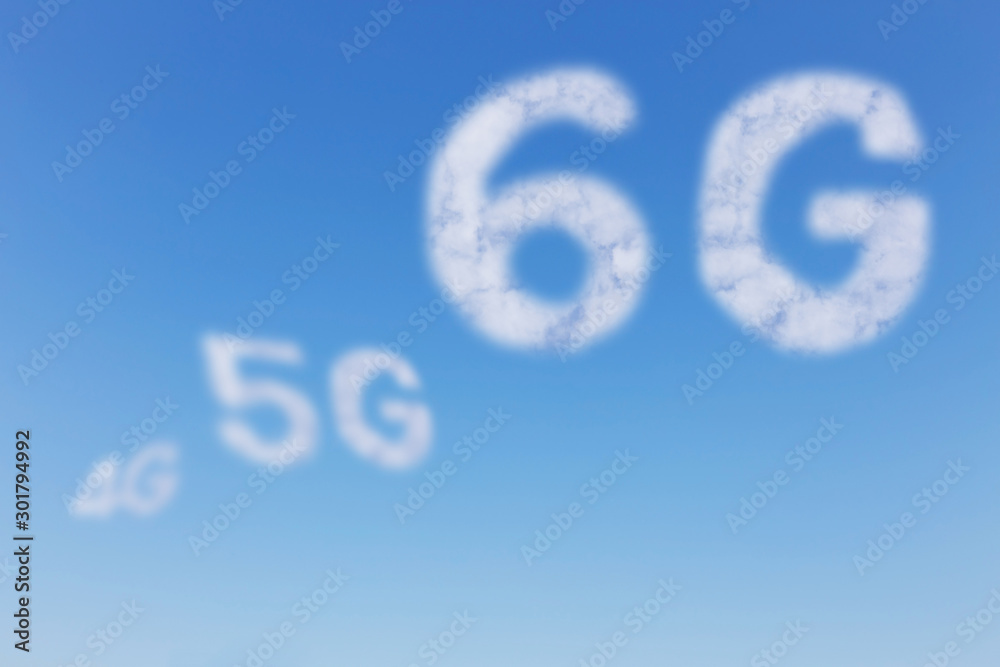 Clouds in the shape of 6G symbol and blurred 4G-5G symbol with a blue sky background. Clouds in the shape of 6G symbol and blurred 4G-5G symbol with a blue sky background.