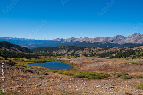 Landscape of a lake and mountains at the top of Cottonwood Pass in Colorado