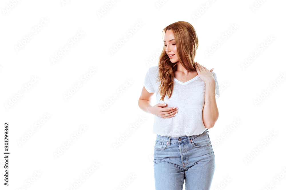Portrait of a happy woman standing with arms folded isolated on a white background Portrait of a happy woman standing with arms folded isolated on a white background