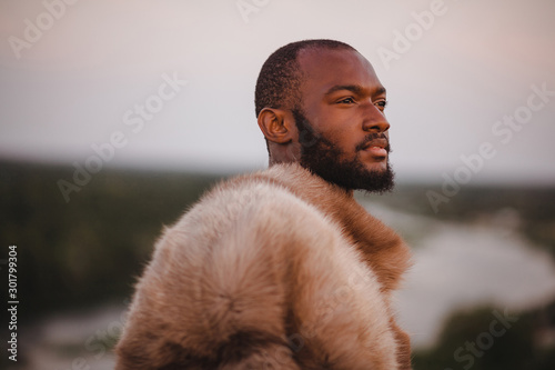 portrait of african american man in furs