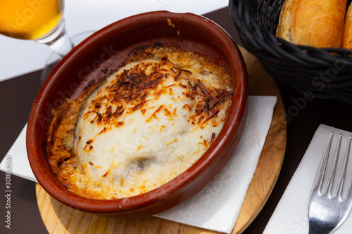 Moussaka dish from eggplant with minced meat baked with cheese