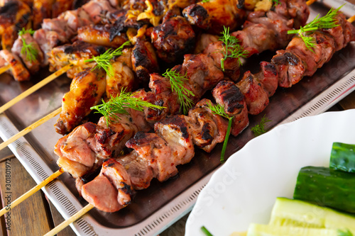 Tasty barbecue pork and chicken closeup