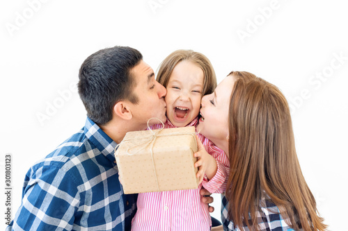 Holidays and celebration concept - Happy family with Christmas presents on white background