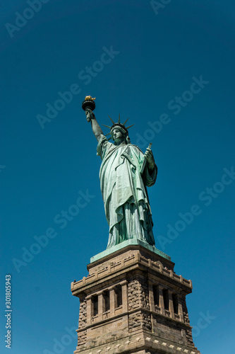 Statue of Liberty  beautify lit on a sunny day