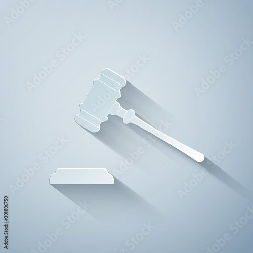 Paper cut Judge gavel icon isolated on grey background. Gavel for adjudication of sentences and bills, court, justice, with a stand. Auction hammer symbol. Paper art style. Vector Illustration