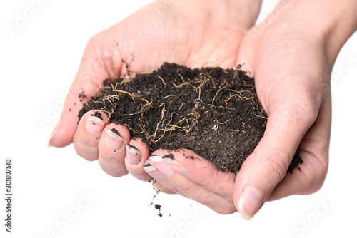 Woman hand with soil. Caring for the earth.