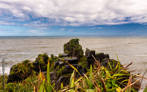 like a ship s bow shaped rock top at the Pacific Ocean