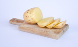 cutting board and chopped potatoes
