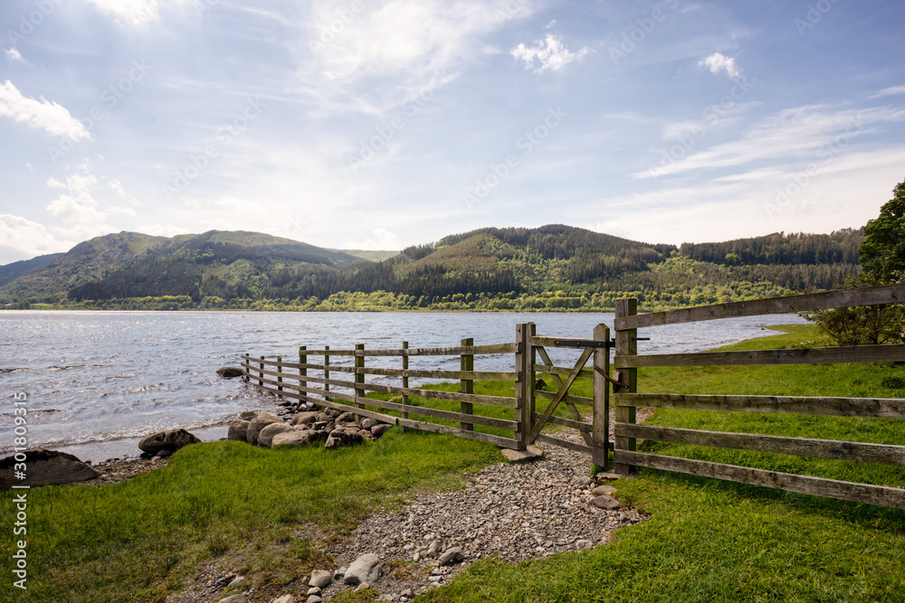 Fence with view over lake in England