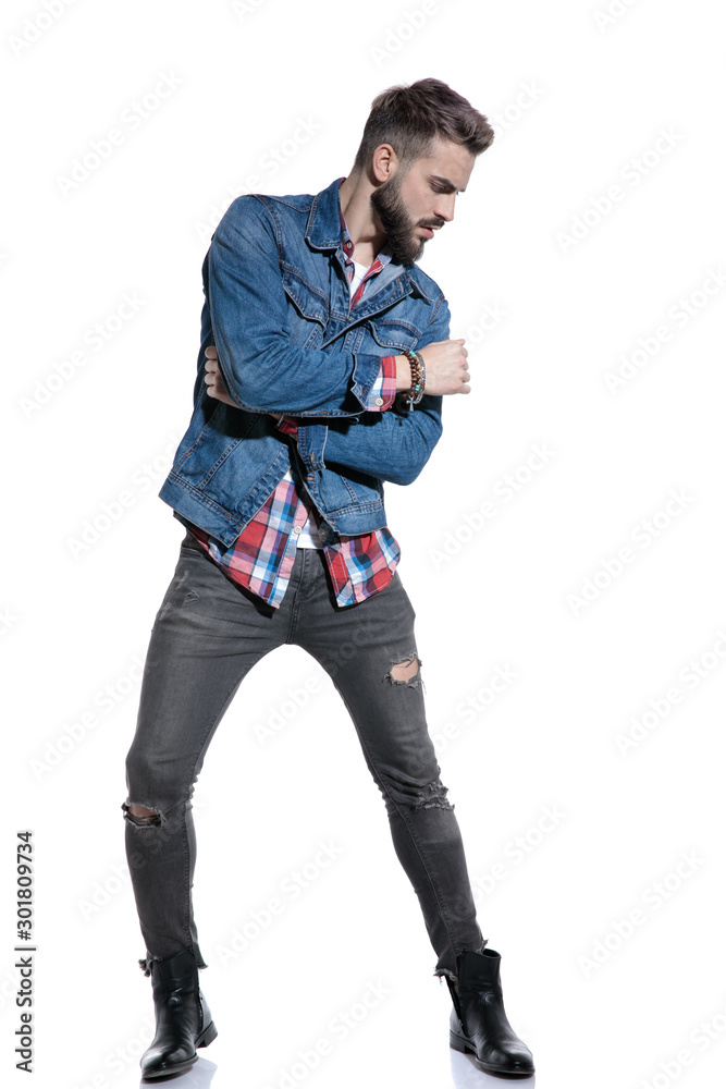 sexy fashion model posing and holding elbow in a fashion pose sexy fashion model posing and holding elbow in a fashion pose