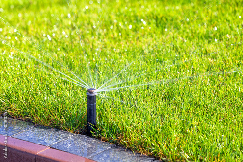 Underground irrigation sprinkler system, automatic watering