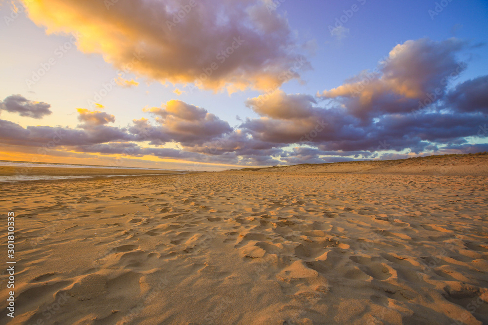 Sand dune on beach at sunsetas for nature background