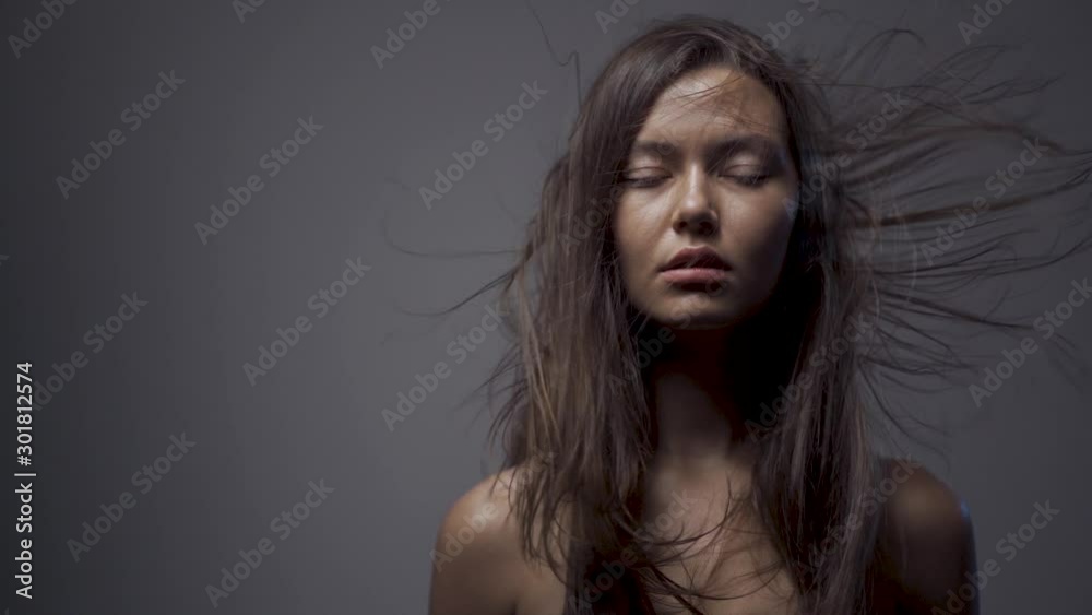 Slow motion girl hair. hair fluttering in the wind.