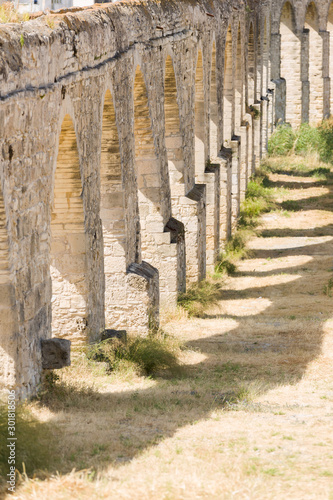 Ruins of a water-conduict, an aqueduct from the Roman ages in Limmasol, Cyprus. photo