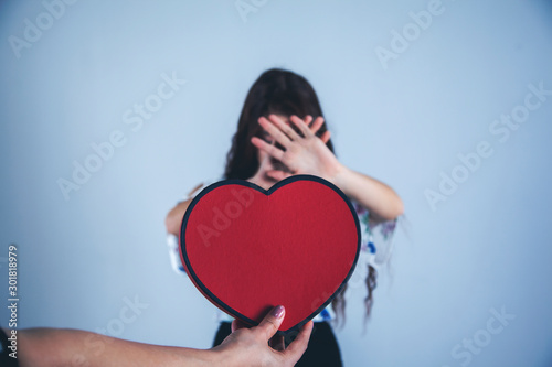 woman hand stop sign on heart