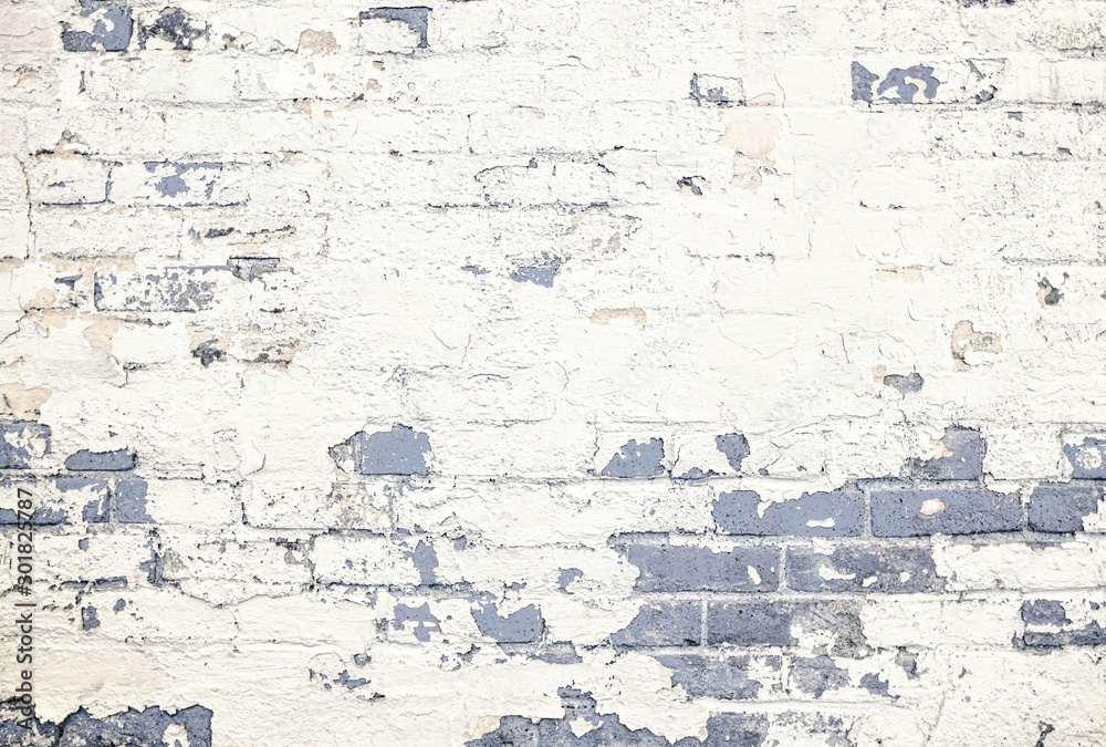 Tinted gray brick wall white peeling paint background