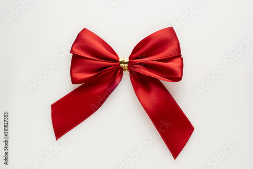 Gift red bow on white background