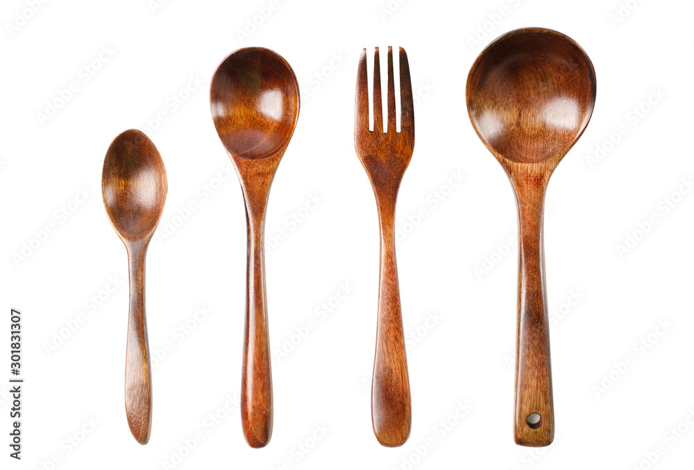Wooden kitchen set isolated on a white background. Spoon, fork, ladle.