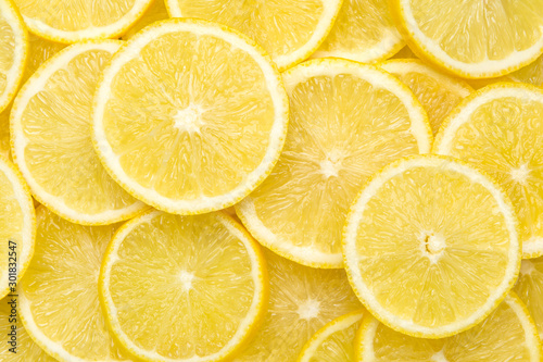 Fresh lemon slices pattern backgrond, close up