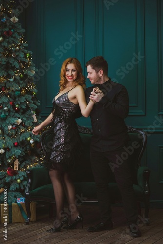 Concept of relationship among men and women. Psychology photo of couple at christmas time 