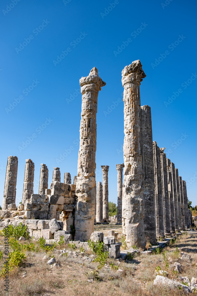 With blue sky,Marble columns of Temple of Tyche, goddess of fortune, Roman, late first century AD, Olba, (Uzuncaburc), Silifke, Mersin,Turkey