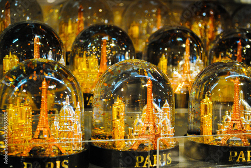Many gold snow globes from Paris