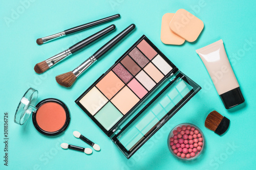 Canvas Print Makeup professional cosmetics on mint background.
