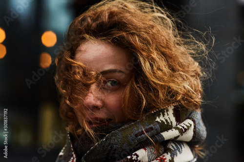 Portrait of woman standing outdoors
