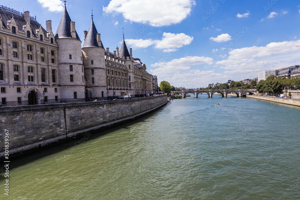 The Seine River, Pont Neuf and Quai de l'Horloge on the sunny day