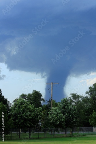Tornado in Hutchinson Kansas on the north side of town with tree's and power line's.