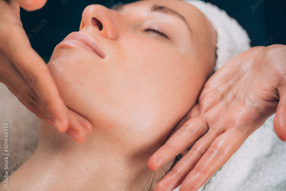 Massaging Face for Facial Fitness