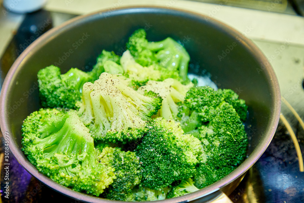 Broccoli is fried with butter or boiled in a pan. Broccoli is fried with butter or boiled in a pan.