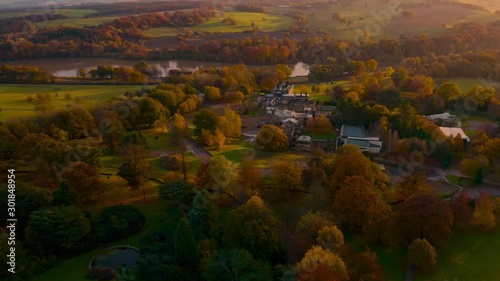 Aerial footage of Autumn Fall colours at Sunset around a Bretton Hall, a beautiful Georgian Country House near Wakefield, UK