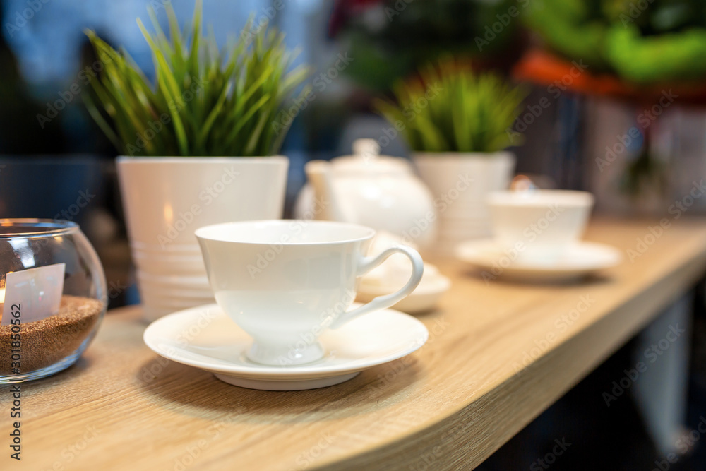 Cup of fresh boiled coffee in cafe with christmas decoration Cup of fresh boiled coffee in cafe with christmas decoration