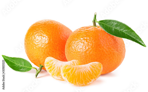Tangerines or clementines with green leaf and slices isolated on white photo