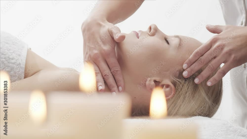 Young, beautiful and healthy woman in spa salon. Traditional Thai massage therapy and skin care. Young, beautiful and healthy woman in spa salon. Traditional Thai massage therapy and skin care.