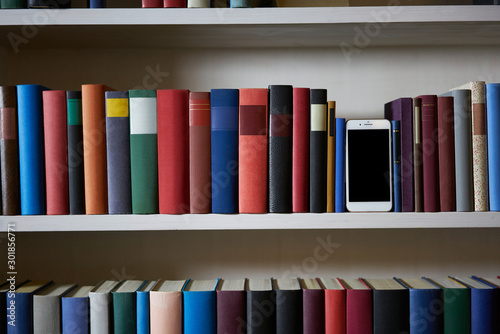 Accurate bookcase with mobile phone