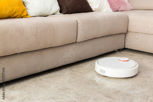 Robot vacuum cleaner cleaning the room