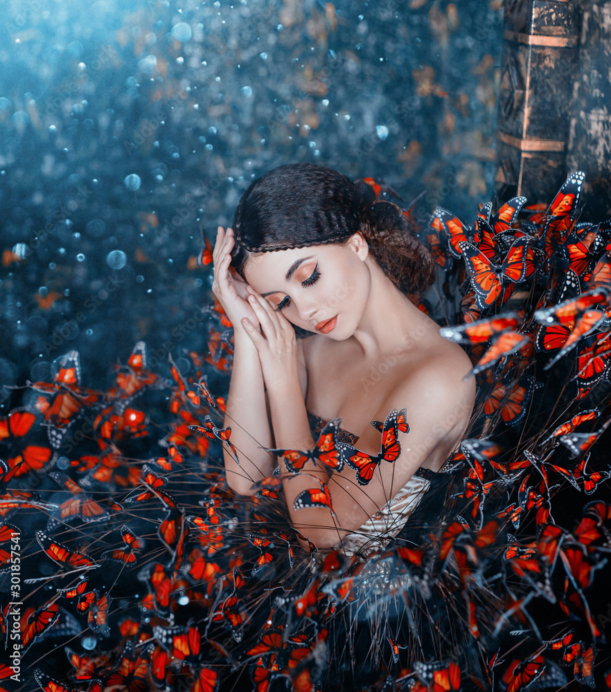 Sleeping Beauty portrait. young brunette woman, creative gentle makeup,  fashion vintage glamorous collected hairstyle. Brunette girl. fantasy dress  with butterflies. Blue orange art color photography Stock Photo | Adobe  Stock