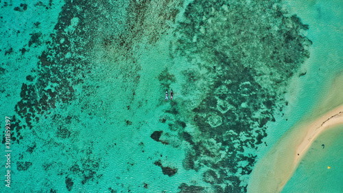 Drone overview of a small fishing boats in the middle of the Red Sea, El Gouna, Egypt