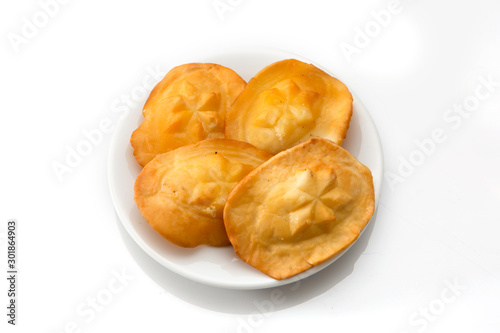 Polish traditional cheese oscypek - Oscypek isolated on white.  Oscypek on a plate.