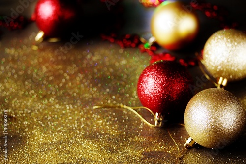 Festive background Christmas and New Year with shiny Christmas balls  lights of garlands and glitter.  copy space. space for text