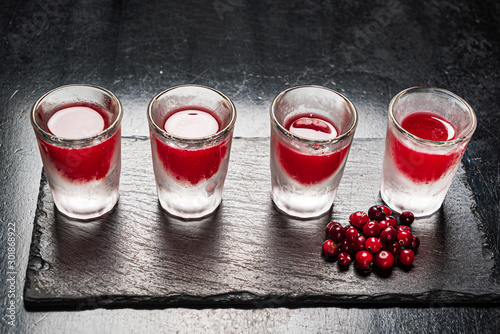 cranberry shots on the black background